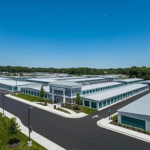 Modern storage facility in Cambridge, MA with various storage units and a clear blue sky